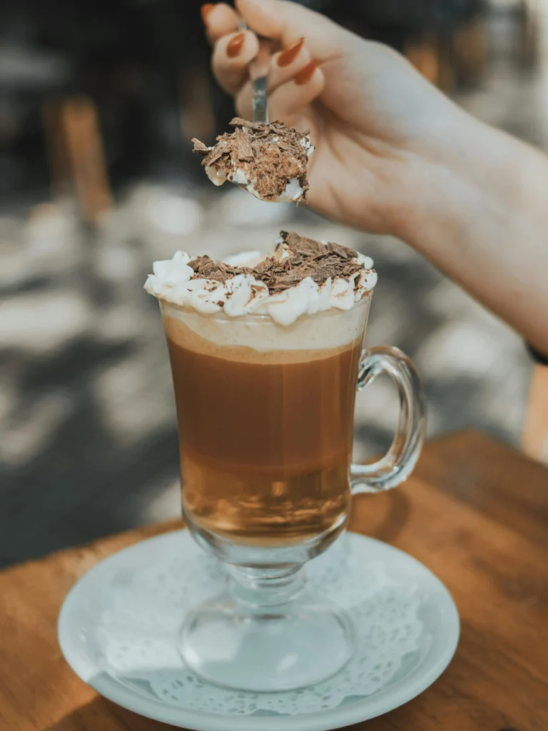 A Glass with Coffee with Whipped Cream and Chocolate Chocolate Panna Cotta