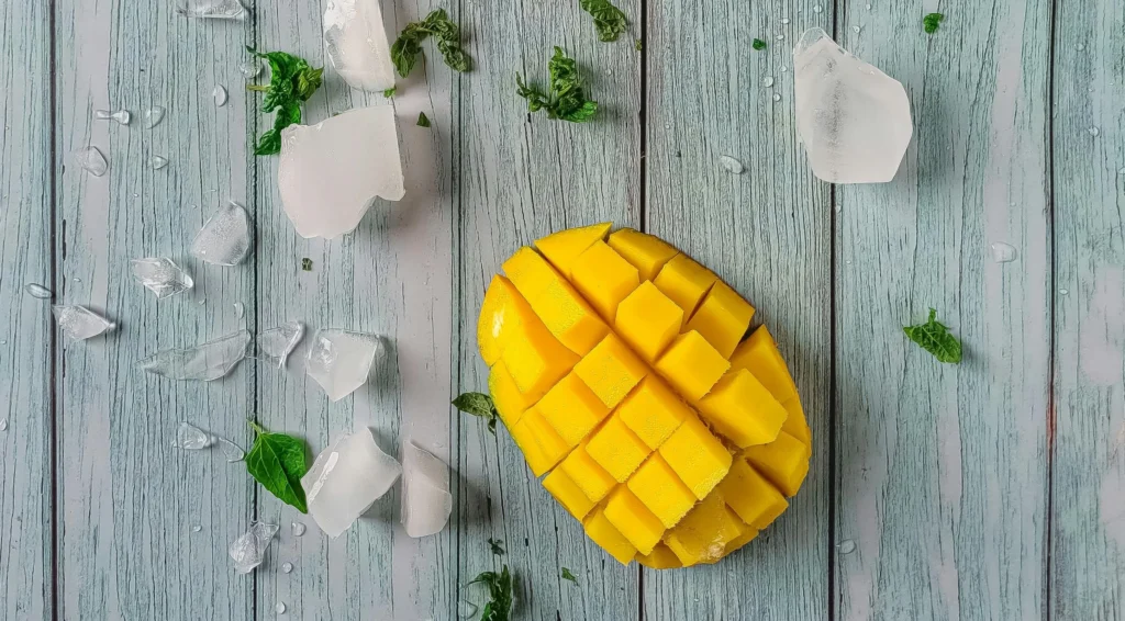 Mango on a Wooden Counter Top with Ice