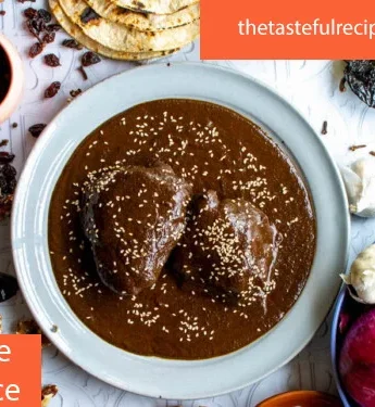 A simmering pot of mole sauce on the stove, filling the kitchen with its enticing aroma as it cooks to perfection