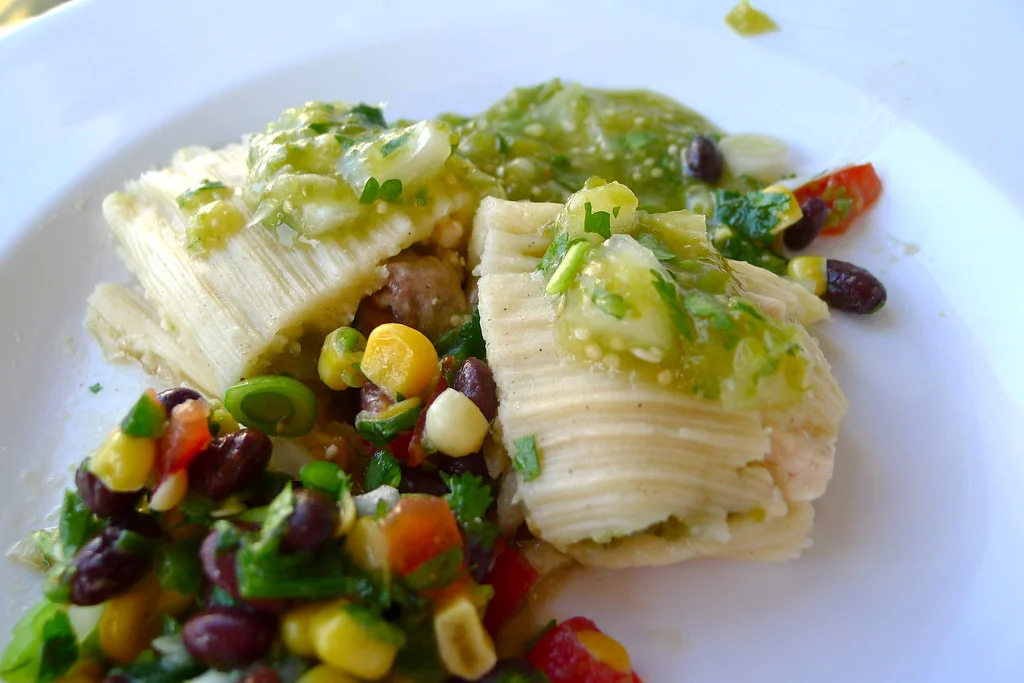 Soaked corn husks used for wrapping chicken tamales recipe