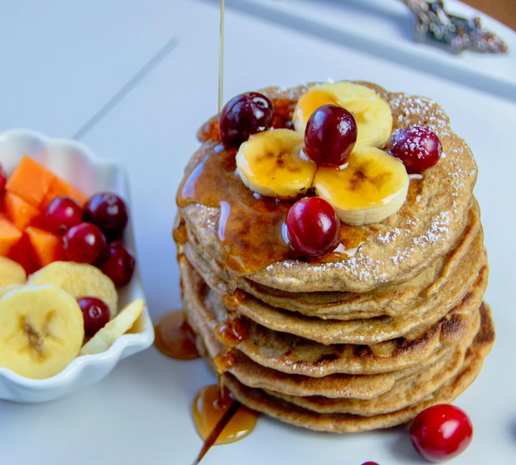 Brown Fluffy Pancakes With Red Cherry on White Ceramic Plate