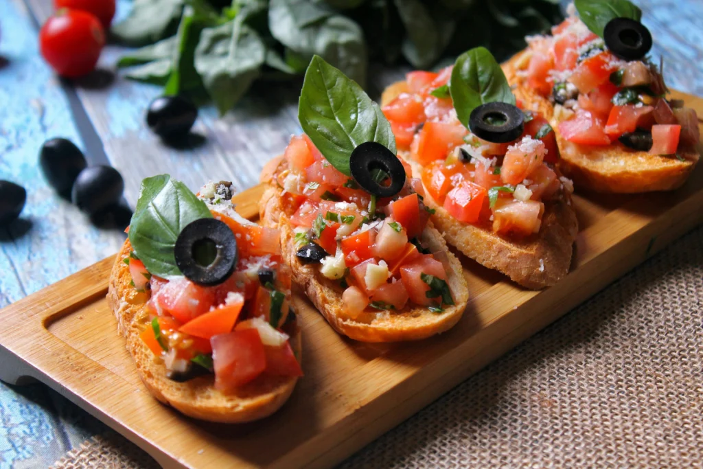 Bruschetta with Tomatoes, Black Olives and Basil