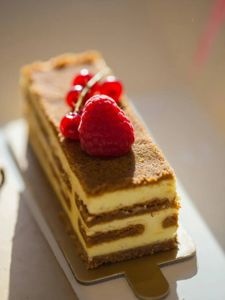 Close-up of a Slice of Tiramisu with a Raspberry on Top