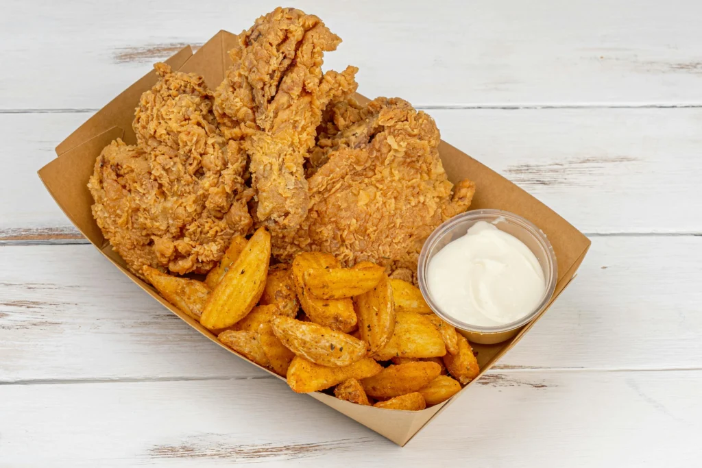 Fried Chicken and Fried Potatoes in a Lunch Box