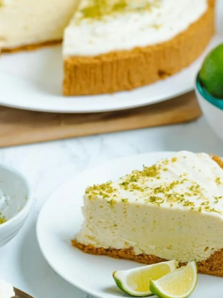 Slicedno bake key lime pie on White Ceramic Plate