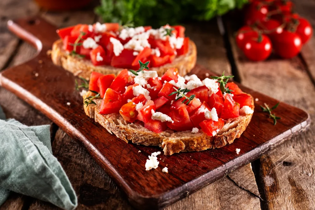 Fresh tomatoes, basil, and garlic for bruschetta topping