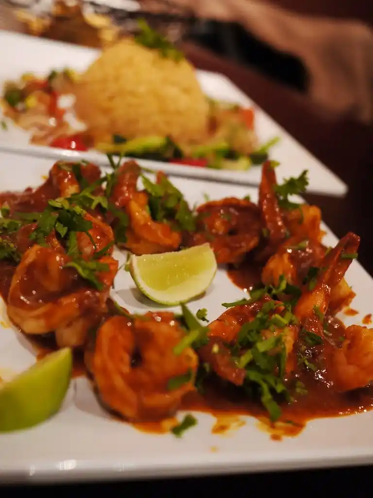 Blending dried chilies with tomatoes and spices for Camarones a la Diabla sauce