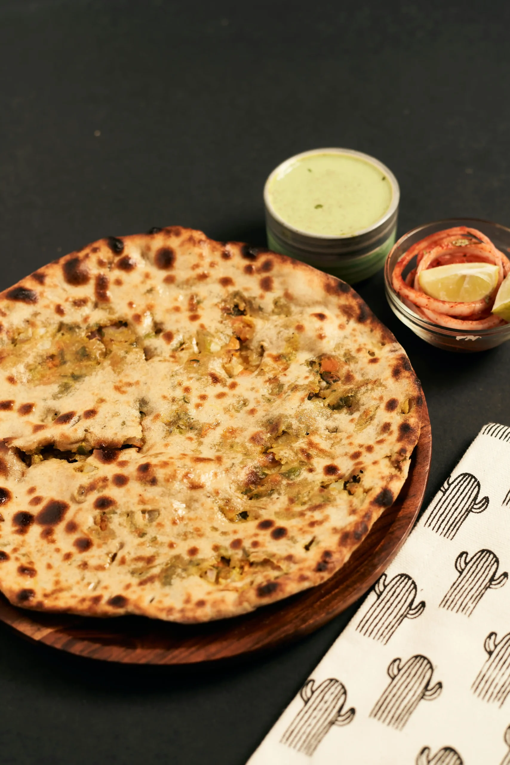 aloo paratha with Cheese on Wooden Plate_11zon