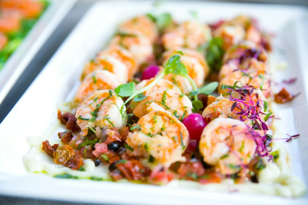 Banquet dish of fried shrimps with herbs-min