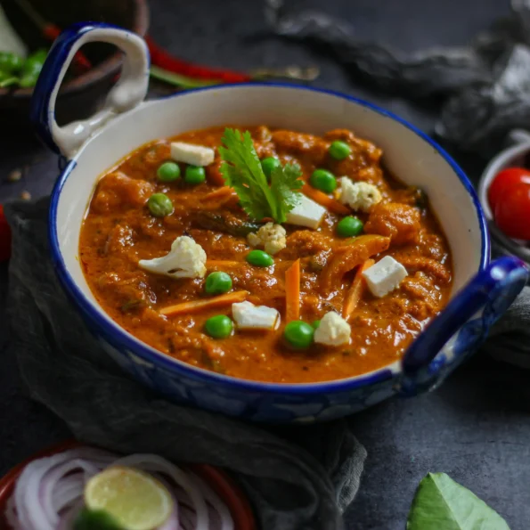 Mattar Paneer Served on Blue Ceramic Bowl