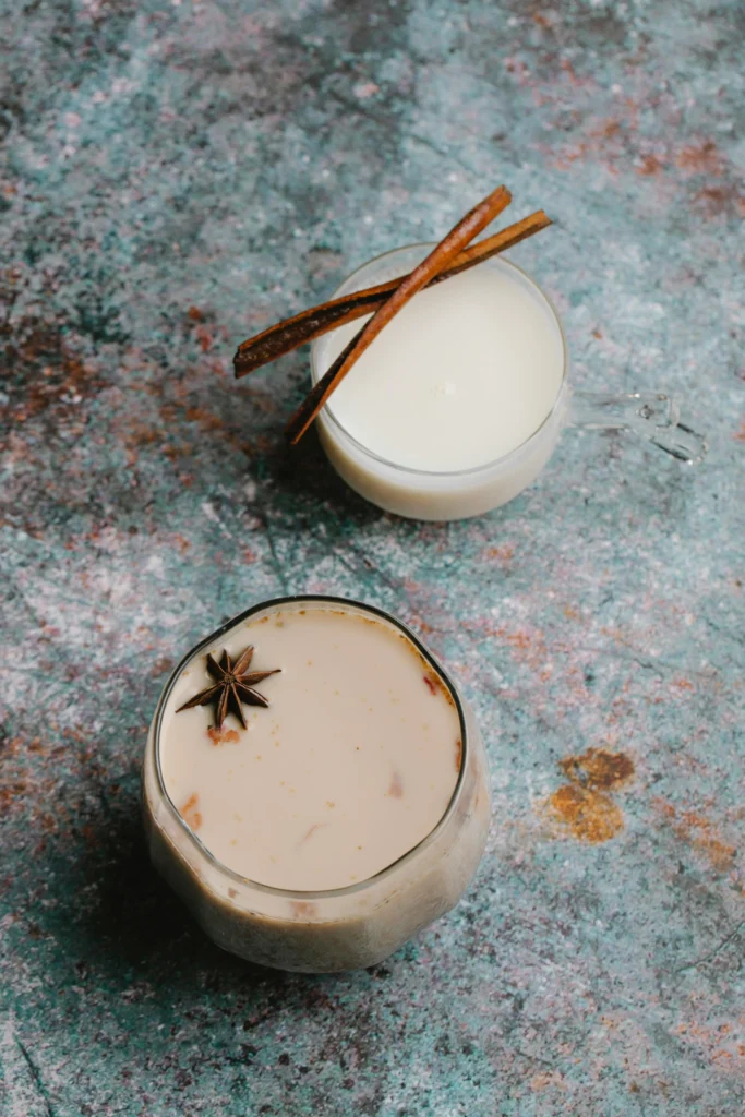 horchata recipe served with sticks of cinnamon and anise