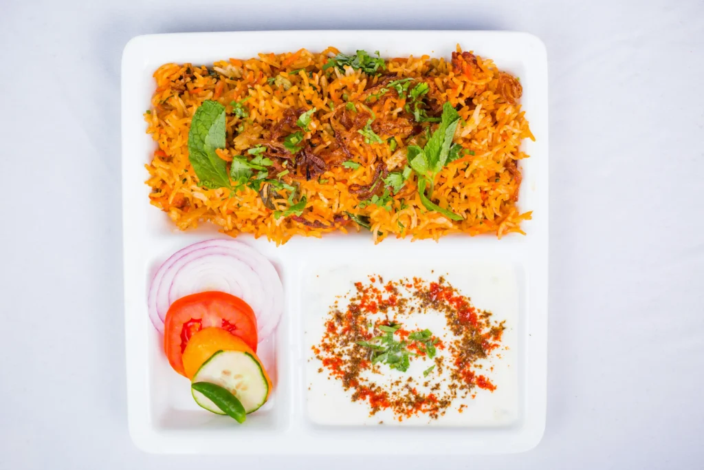 vegetable pulao with Spices on Plate on Table