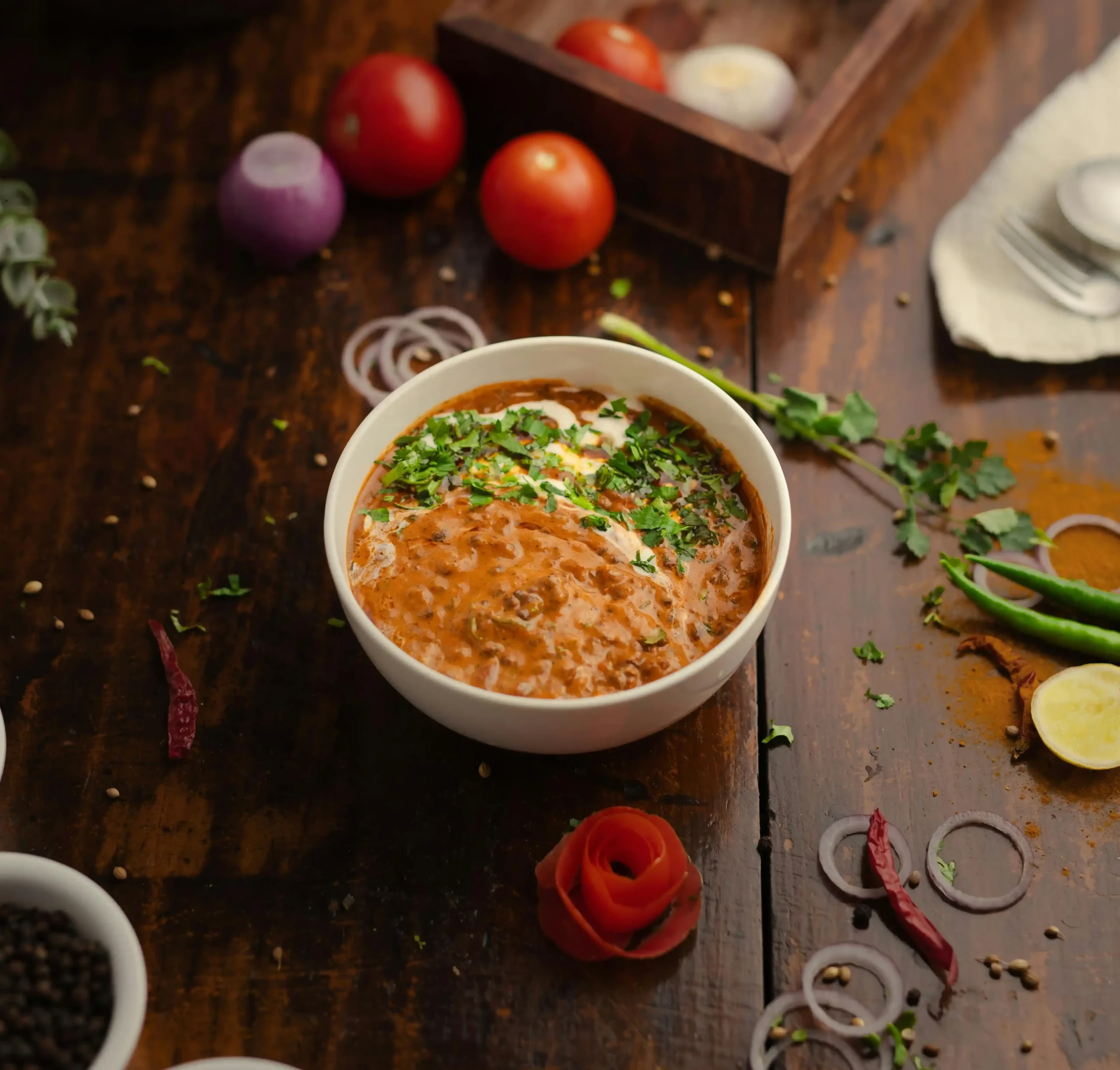 A spoonful of Masoor Dal lifted from the bowl, highlighting its thick and hearty texture