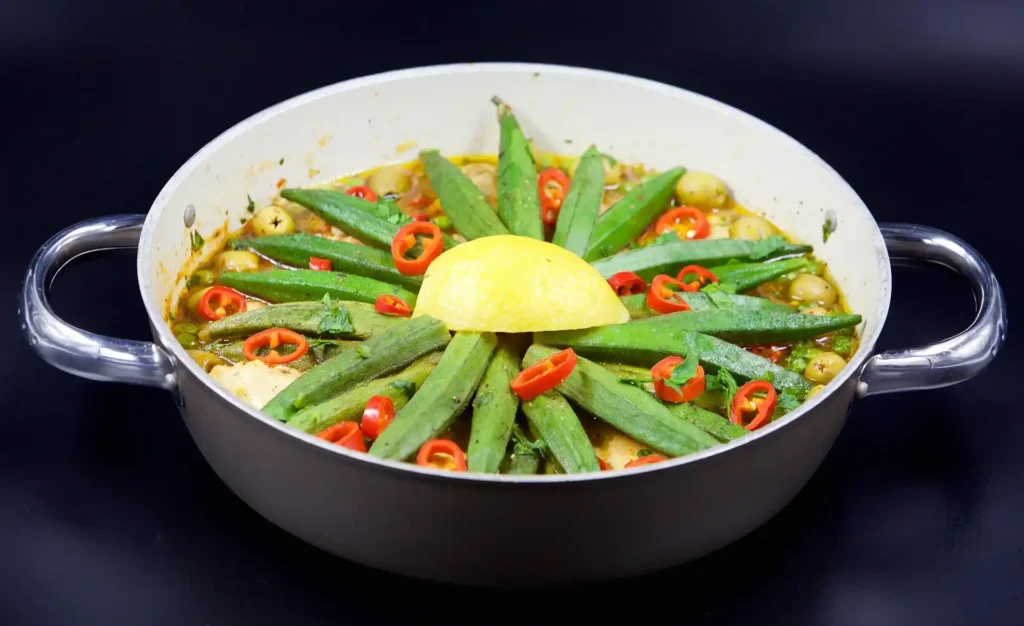 Chopped okra pieces in a bowl, prepared for making Bhindi Masala