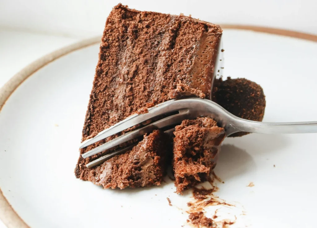 Close-Up Photo Of Sliced Torta Caprese Cake