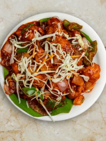 Sweet and Sour Chicken Dish on a Plate