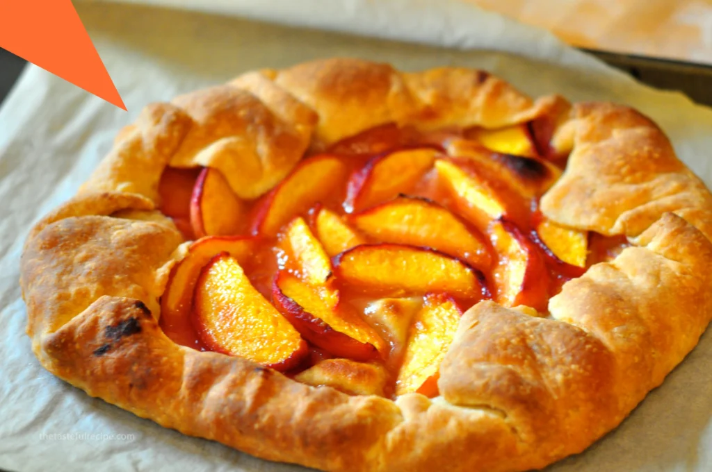 Close-up of a Crostata slice showing the layers of flaky crust and fruit filling