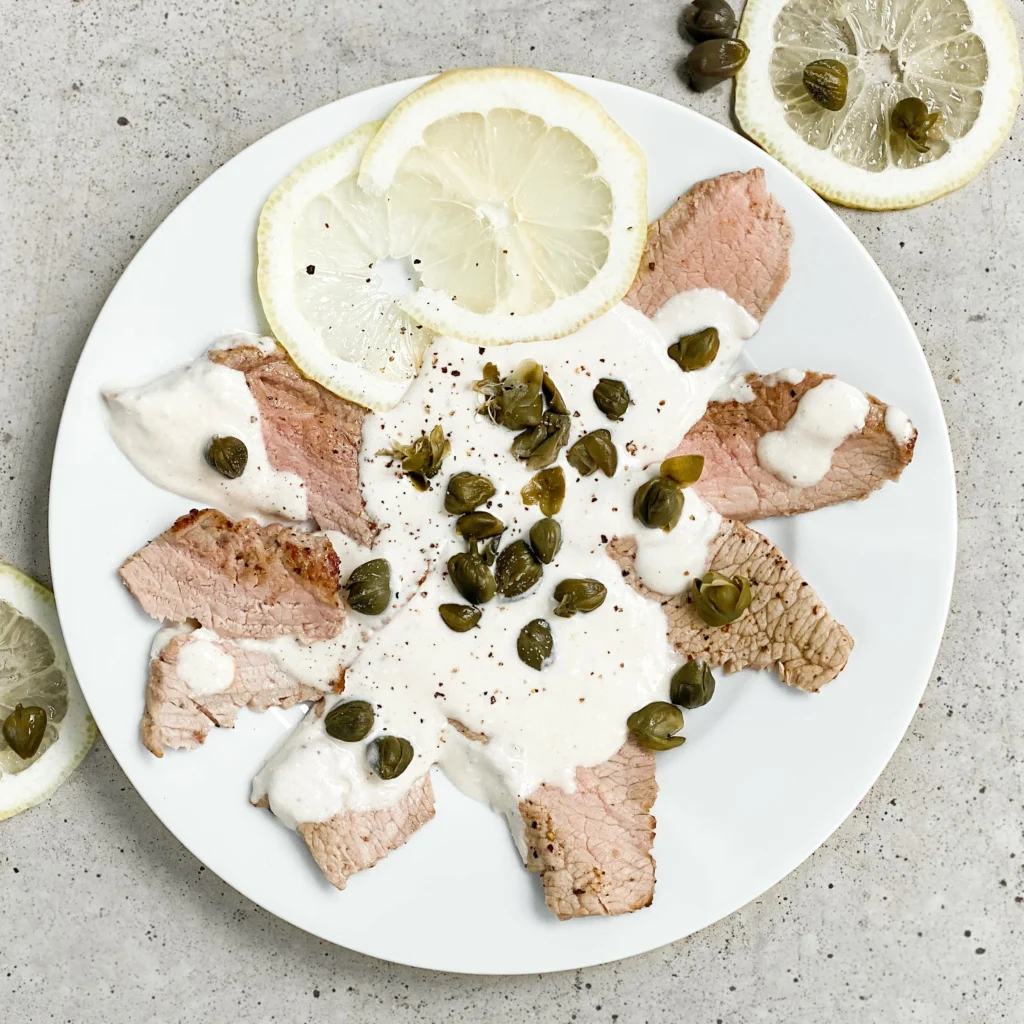 Vitello Tonnato on White Ceramic Plate