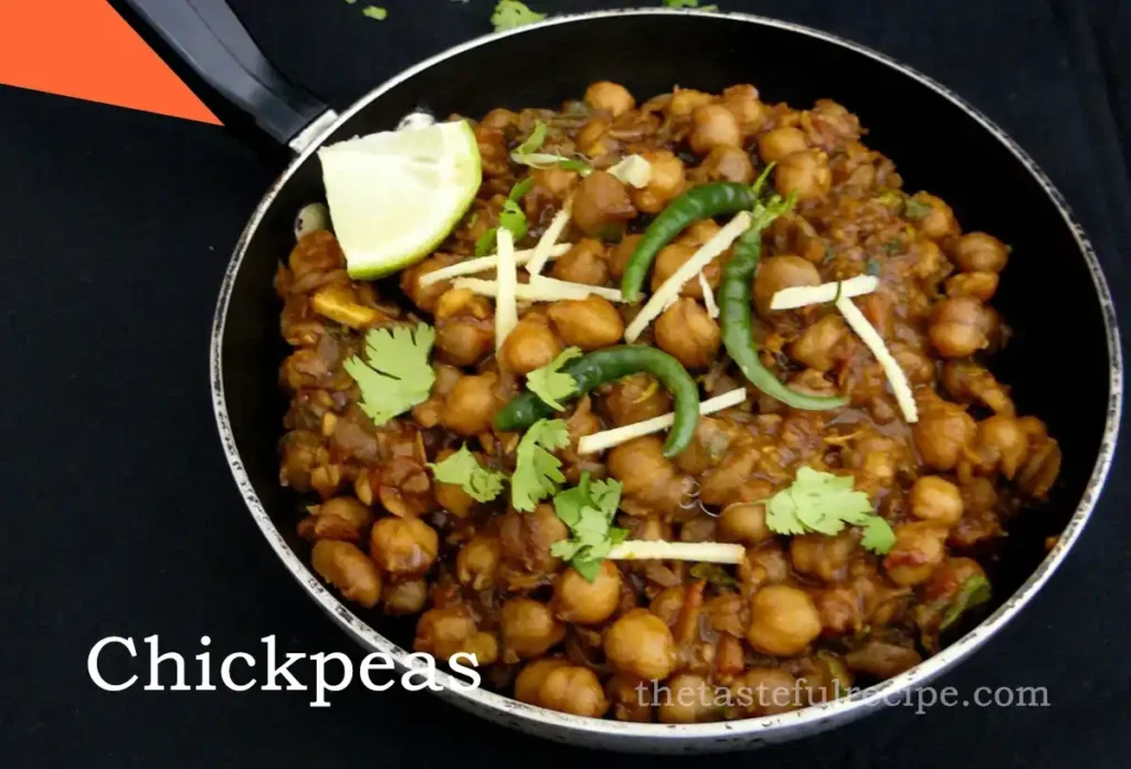 Pindi Chole being served into a bowl from a pan