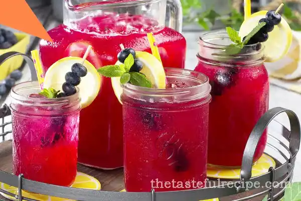 Close-up of fresh blueberries and lemon slices used as garnishes