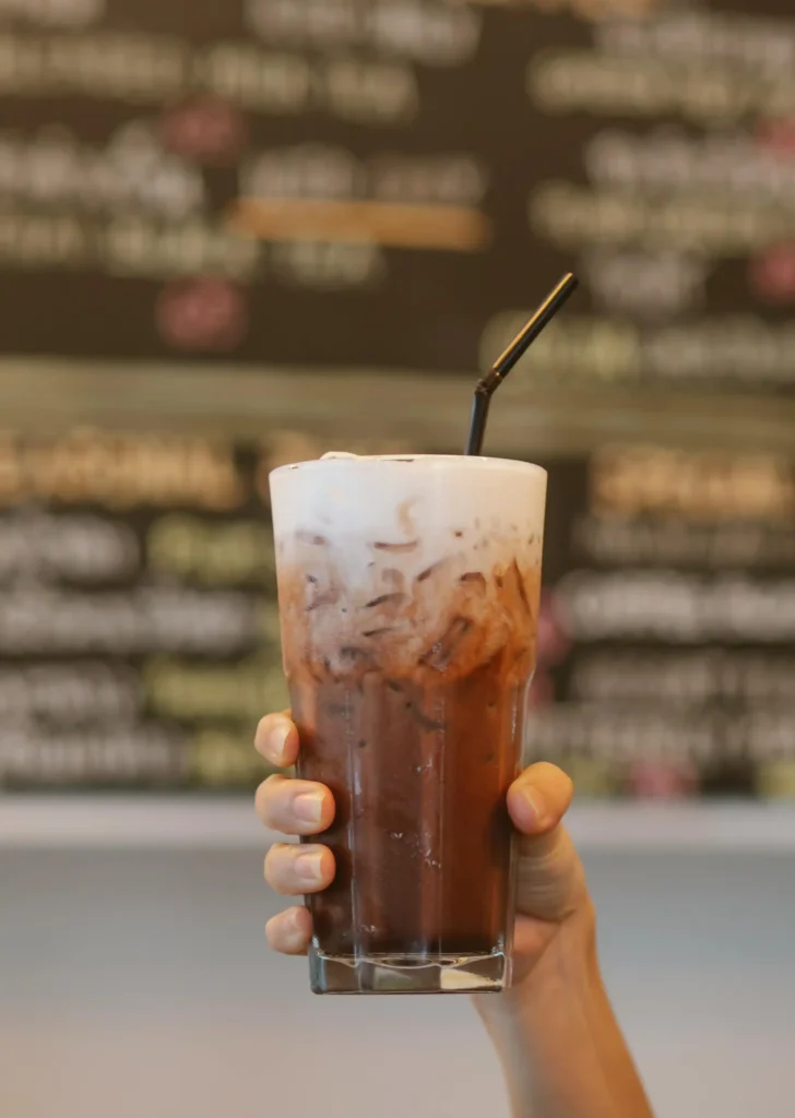 Refreshing glass of Cold Brew Coffee with ice and a straw