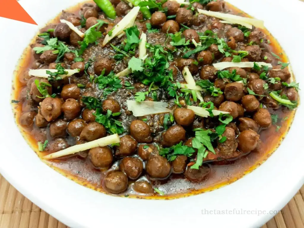 Freshly cooked Pindi Chole in a pan, ready to be served