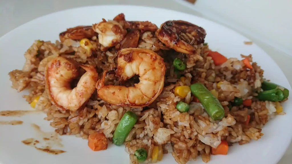 Shrimp Fried Rice packed in a meal prep container, ready for a quick and easy lunch