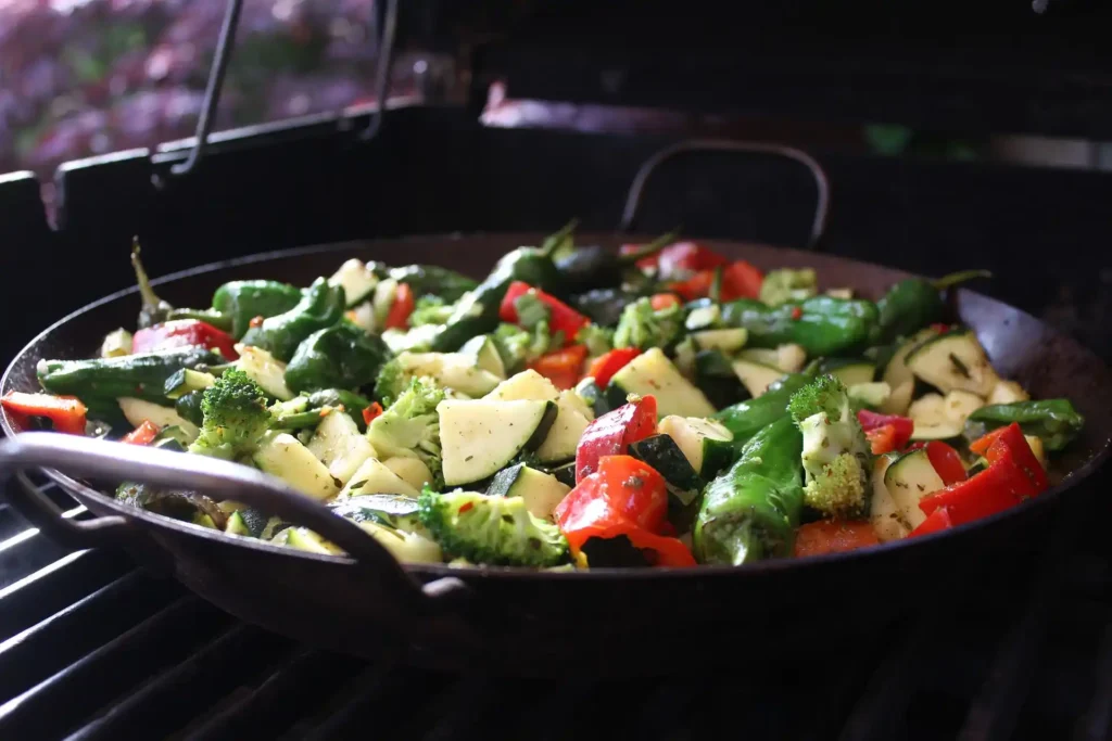 Chopped Chinese cabbage leaves added to the skillet for stir frying