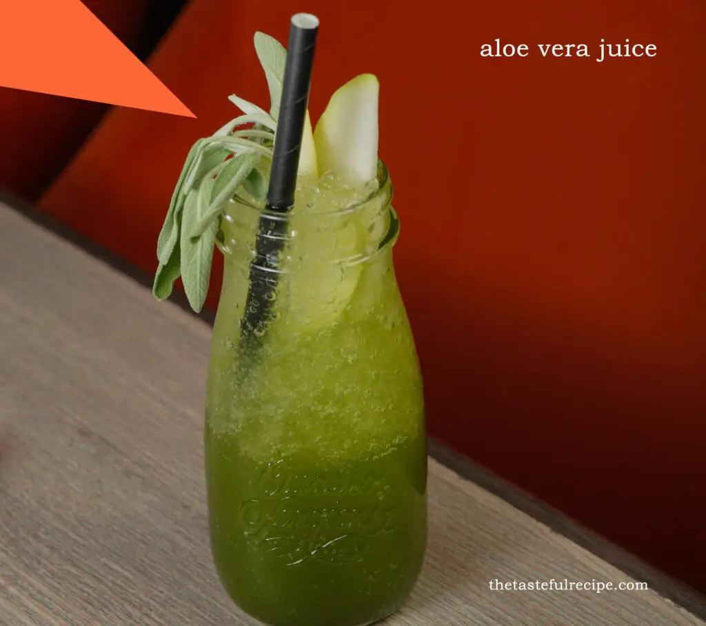 Pouring homemade aloe vera juice into a glass