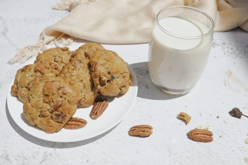 Peanut Butter Cookies on White Ceramic Plate Beside a Glass of Milk