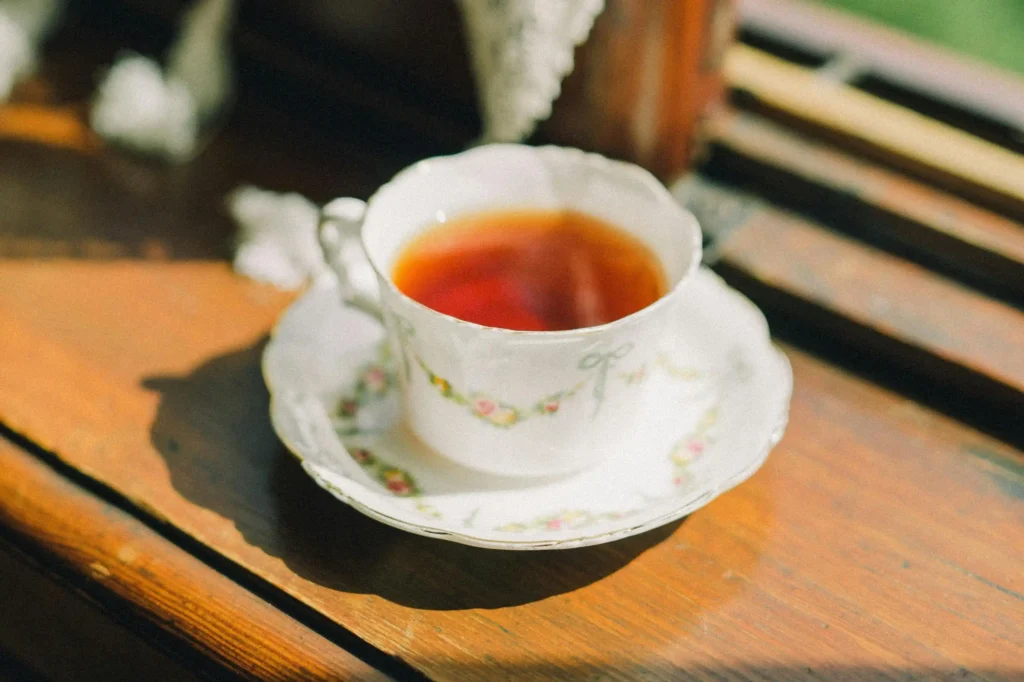 Cup of Ginger Tea in Close Up Photography