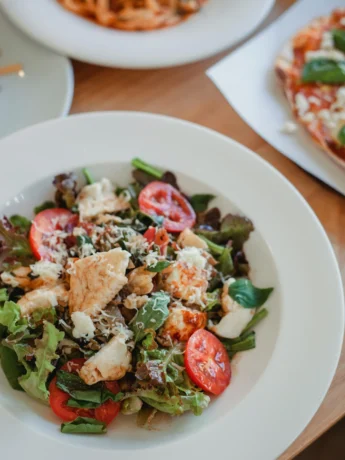 Delicious Chicken Salad in plate on table