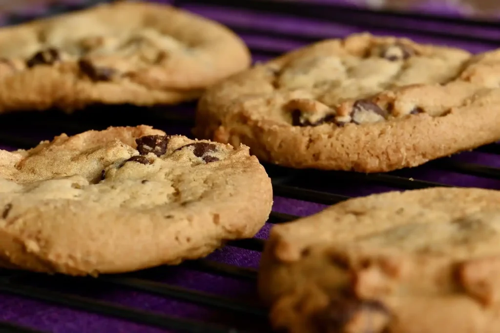 Plate of soft peanut butter cookies with chocolate chips for added sweetness