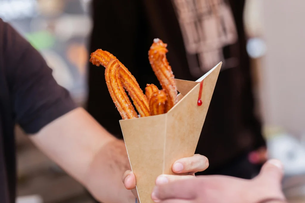 Mexican churros Sticks on a Paper Cup