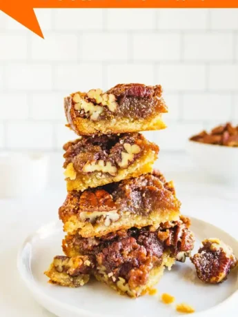 Homemade pecan pie bars with a golden crust and nutty caramel topping