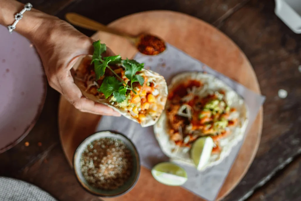 A Person Holding a Carne Asada Tacos