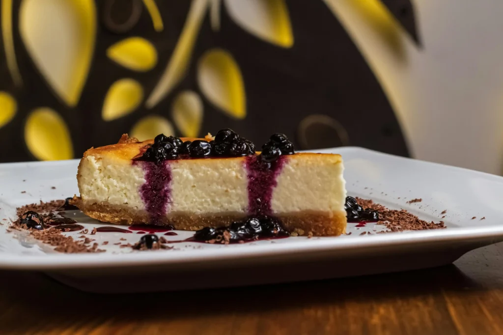 Close-Up Shot of a Slice of Torta della Nonna on a Plate