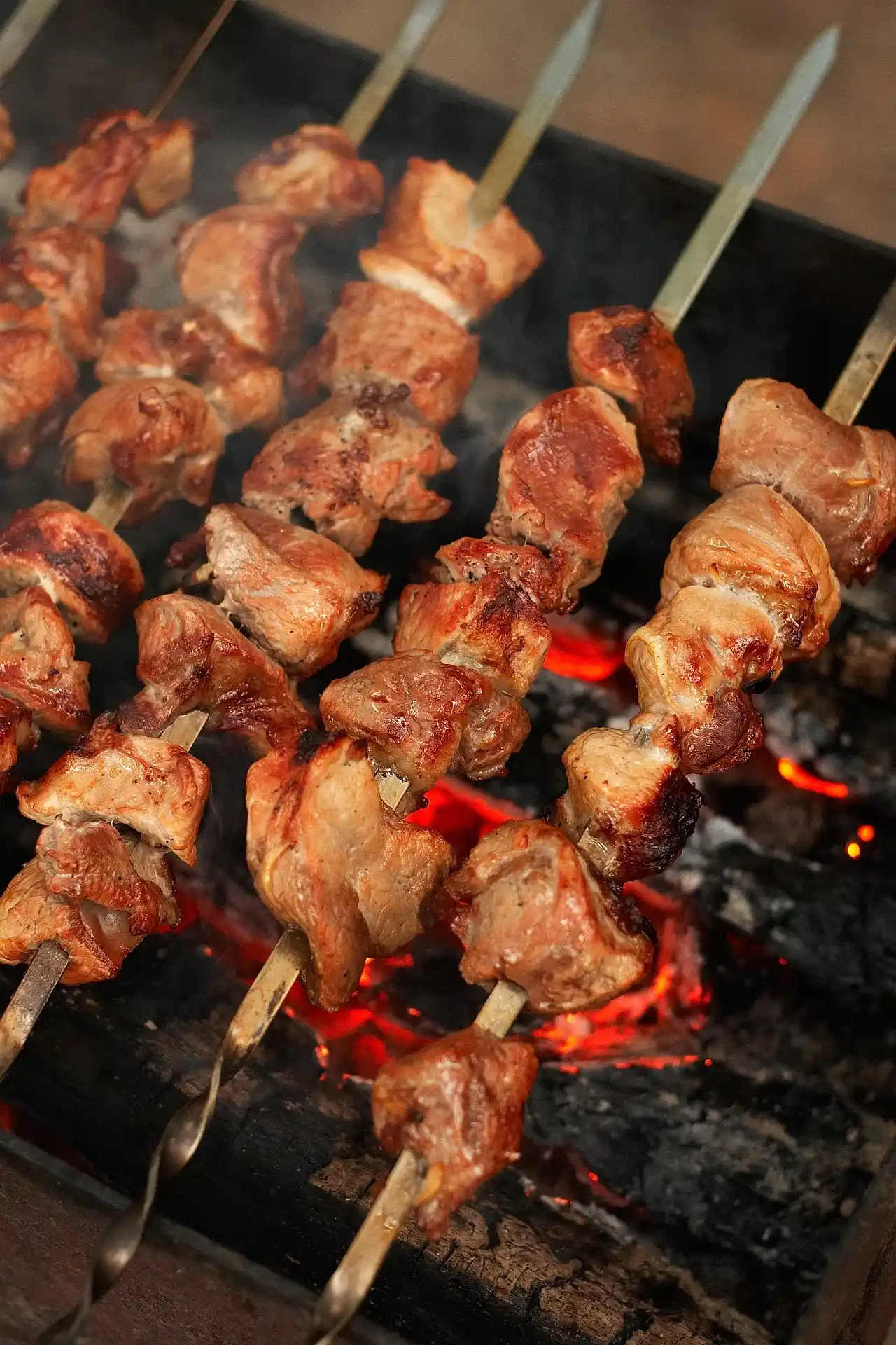 Spiedini skewers served with a side salad and balsamic glaze drizzle